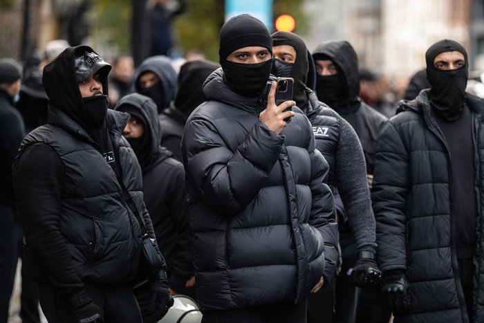 Masked men march through Whitechapel, Tower Hamlets