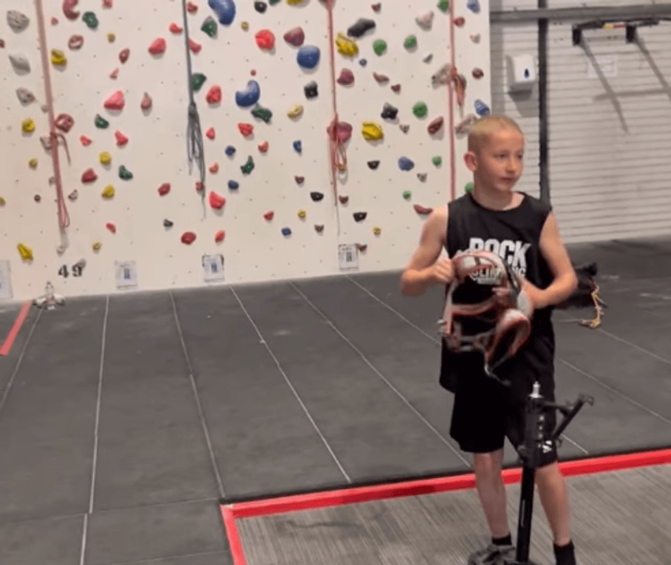 Mason near climbing wall