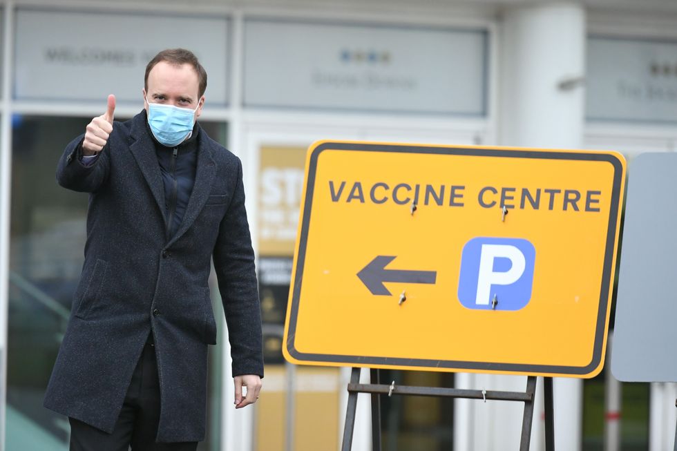 Matt Hancock gives a thumbs up outside a Covid-19 vaccine centre