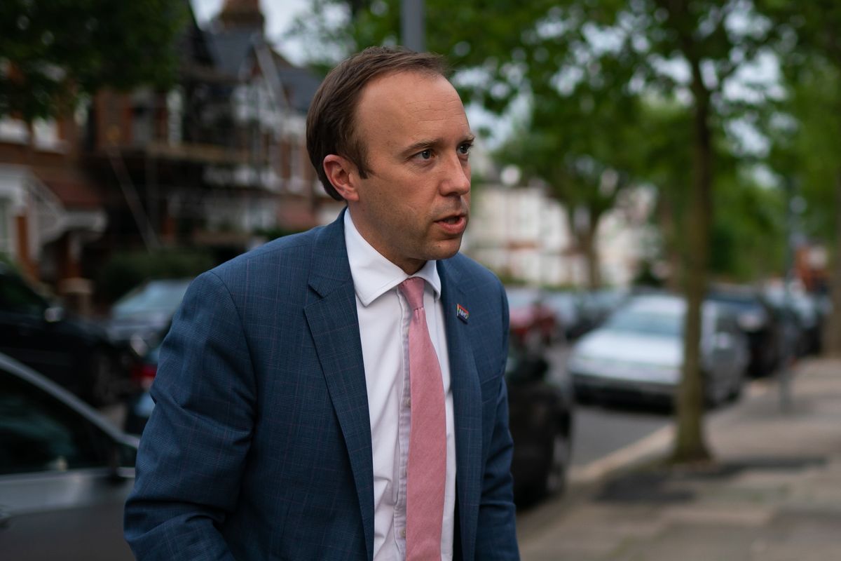 Matt Hancock talking to the media outside his house