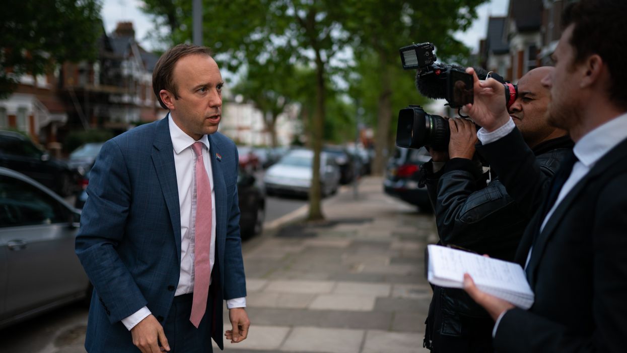Matt Hancock talking to the media outside his house