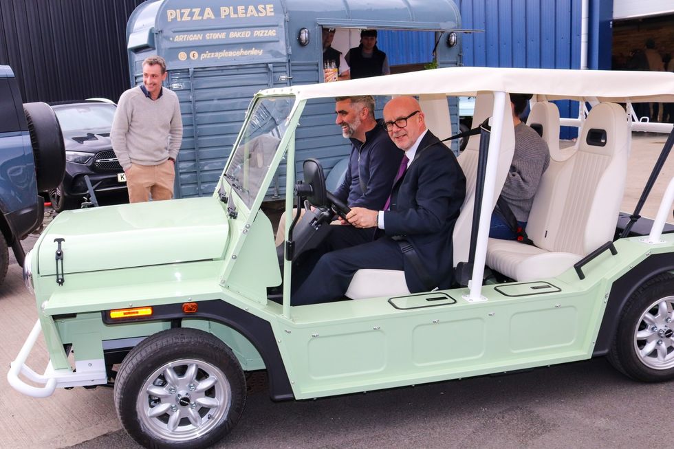 Matt Western, MP for Warwick and Leamington driving a MOKE