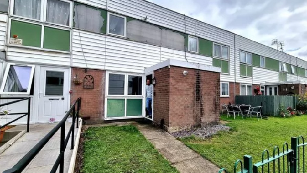 Matthews outside his flat