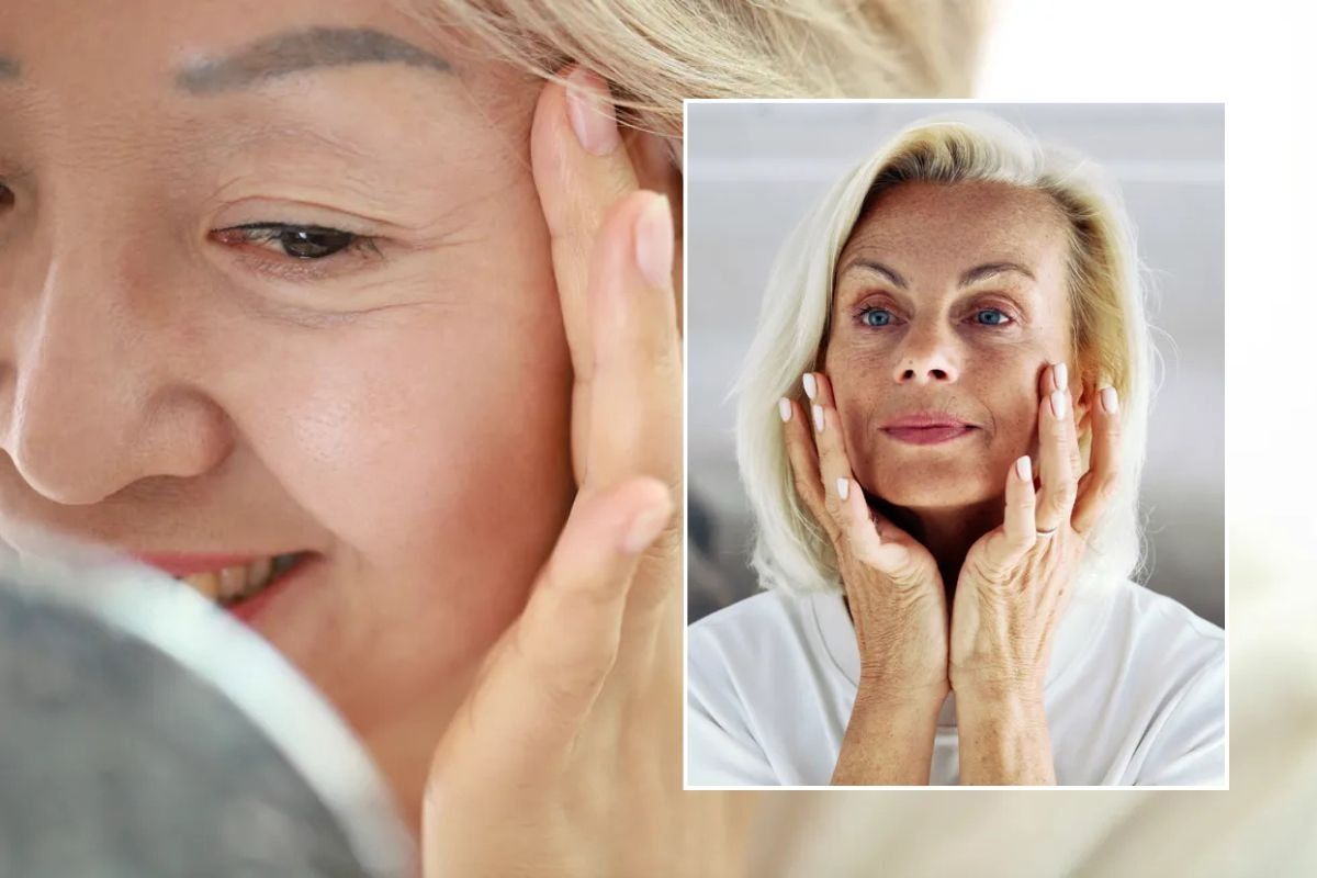 Mature woman checking lines around eyes / Mature woman examining face in mirror