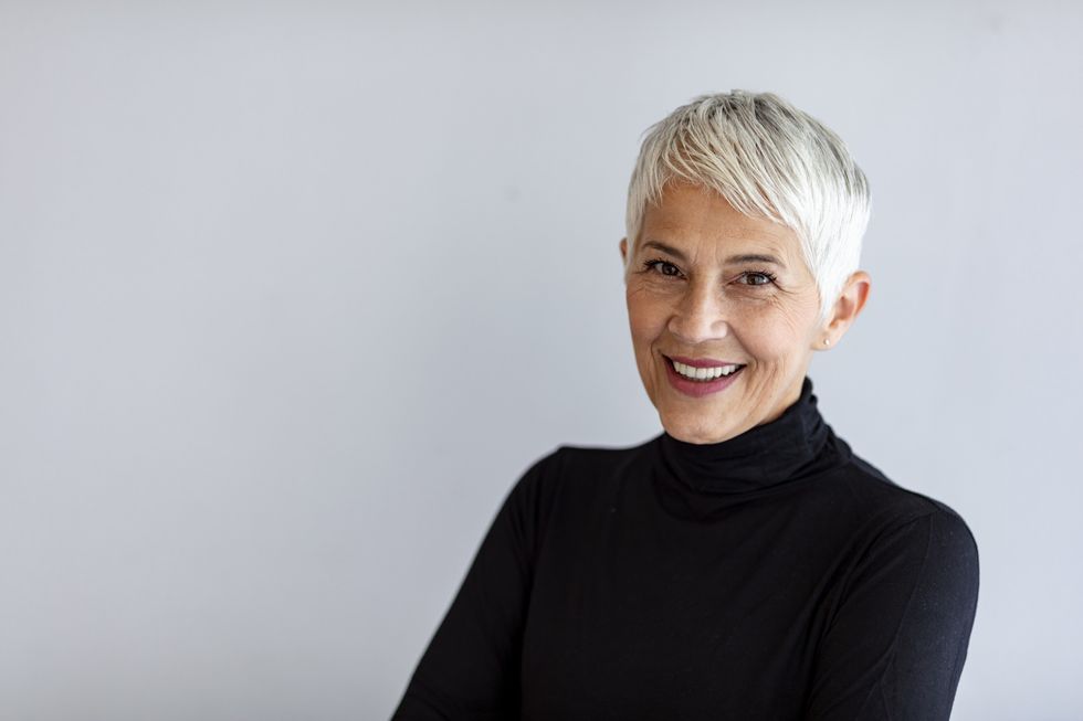 Mature woman wearing black jumper