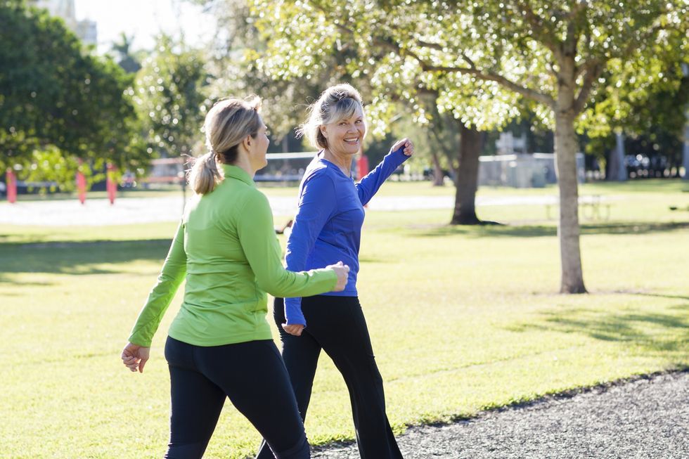 Mature women walking in a park