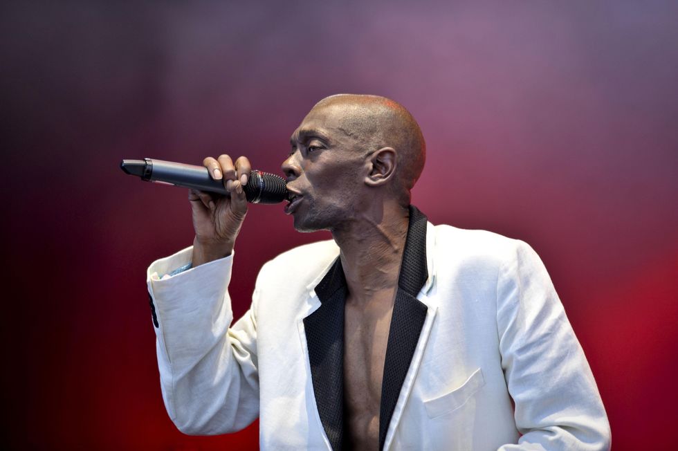 Maxi Jazz on the pyramid stage as Faithless perform on the last day of Glastonbury Festival 2010, at Worthy farm in Pilton, Somerset.