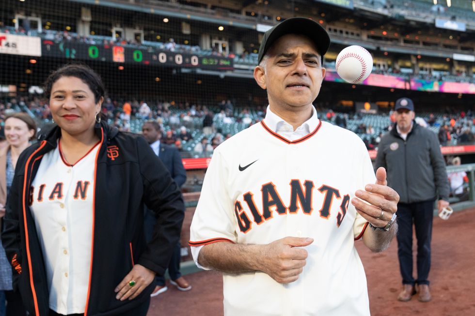 Mayor of London Sadiq Khan at the San Francisco Giants v Colorado Rockies baseball game at Oracle Park with the Mayor of San Francisco, London Breed (left), before pitching the first ball to start the game, during his 5 day visit to the US in a bid to boost London's tourism industry. Picture date: Tuesday May 10, 2022.