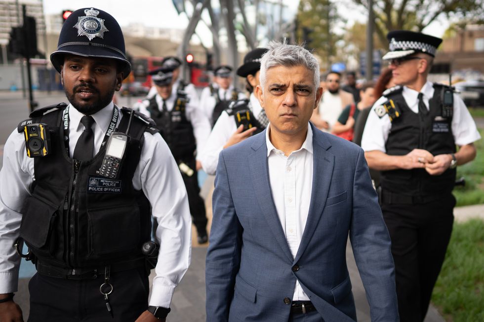 Mayor of London, Sadiq Khan (centre), and Metropolitan Police Commissioner, Mark Rowley (right), during a visit to Stratford, east London with the Community Outreach Team to engage with residents and encourage recruitment to form part of a more diverse and representative police service. Picture date: Friday October 28, 2022.
