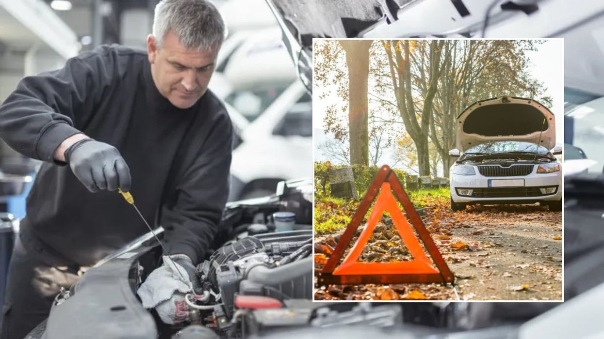 Mechanic checking a vehicle and a broken down car
