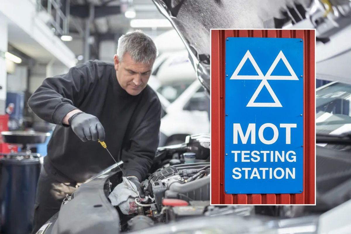 Mechanic performing an MOT test and an MOT test sign