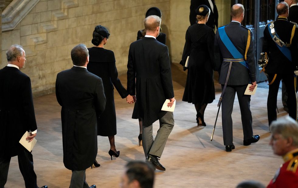 Meghan, Duchess of Sussex and Prince Harry, Duke of Sussex are seen leaving The Palace of Westminster after the procession for the Lying-in State of Queen Elizabeth II on September 14, 2022 in London, England. Christopher Furlong/Pool via REUTERS