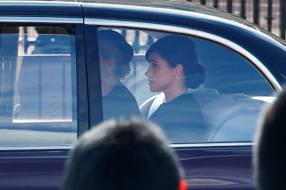 Meghan, Duchess of Sussex, is pictured during the procession of the coffin of Britain's Queen Elizabeth from Buckingham Palace to the Houses of Parliament, in London, Britain, September 14, 2022. REUTERS/Sarah Meyssonnier