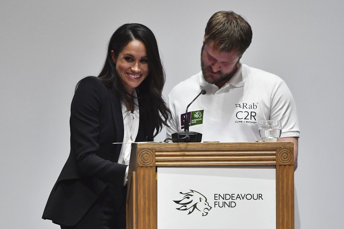 Meghan Markle and Neil Heritage