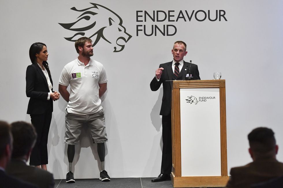 Meghan Markle and Neil Heritage