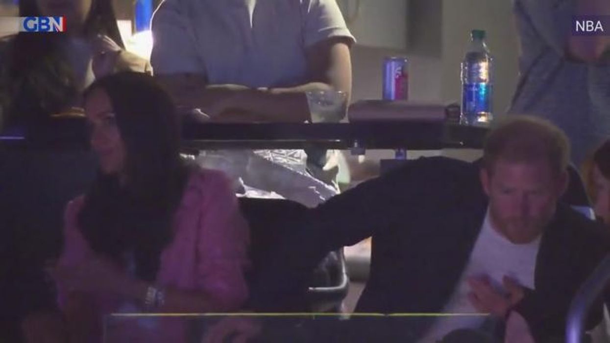 Meghan Markle snubs kiss from Prince Harry at NBA game as Duke of Sussex pulls awkward expression