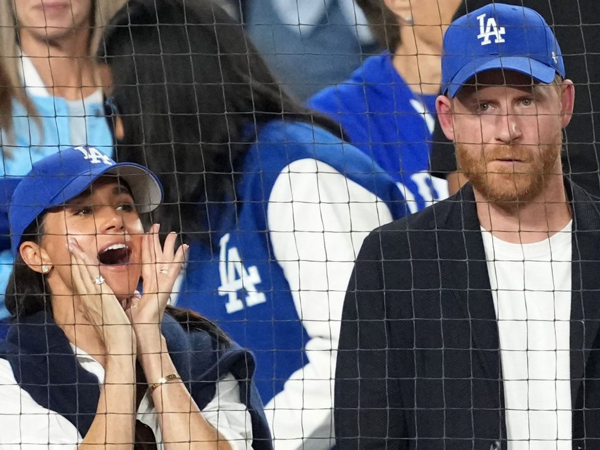 Meghan Markle grapples with split allegiances during new outing with Prince Harry