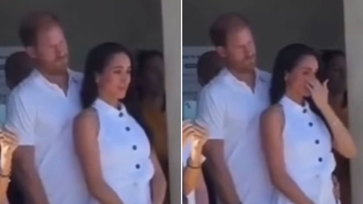 Meghan Markle wipes away a tear alongside Prince Harry
