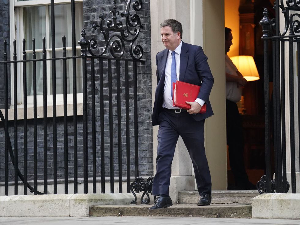 Mel Stride walking out of Downing Street