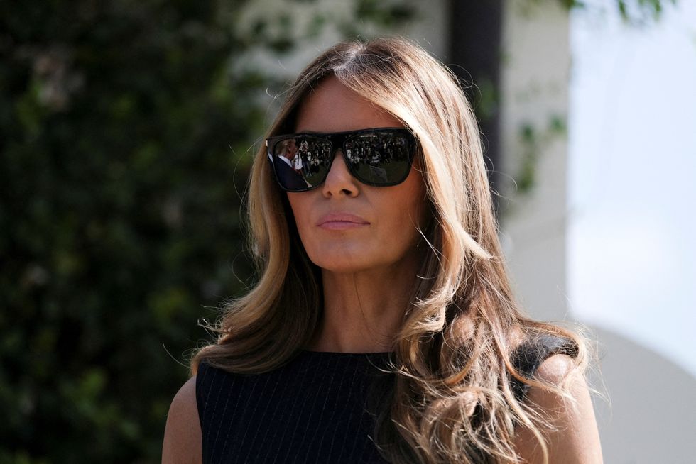 Melania Trump, wife of former U.S. President Donald Trump stands outside a polling station during midterm election in Palm Beach, Florida, U.S. November 8, 2022. REUTERS/Ricardo Arduengo REFILE - QUALITY REPEAT