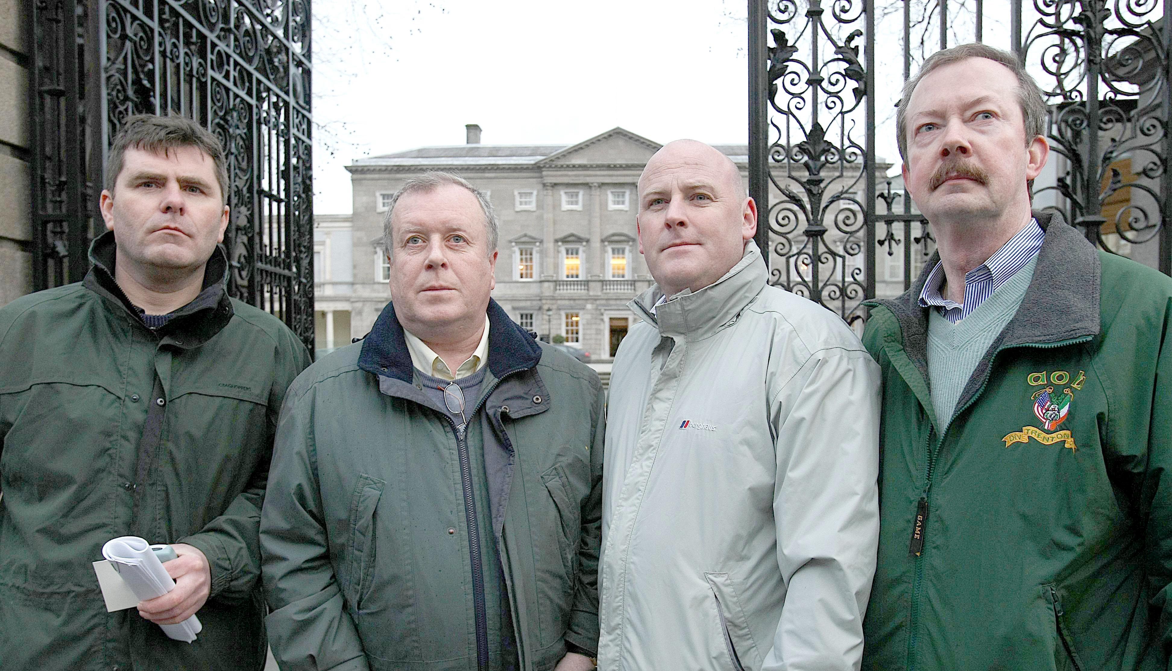 Members of a NI delegation, Mark Sykes (second from right) outside the gates of Leinster House, Dublin, Ireland.