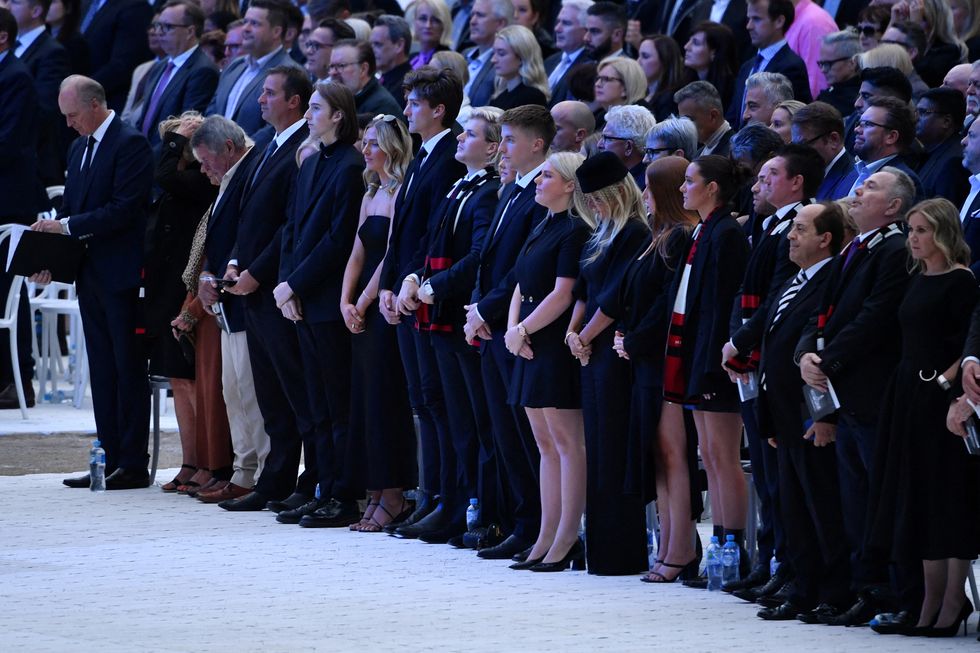 Members of Shane Warne's family attend the State Memorial Service for the cricket legend at the Melbourne Cricket Ground (MCG) in Melbourne, Australia, March 30, 2022. AAP Image/Joel Carrett via REUTERS