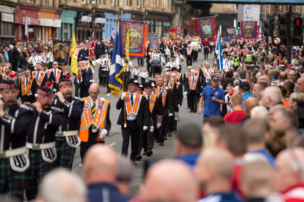 Members of the County Grand Orange Lodge take part in the annual Orange walk parade through the city centre of Glasgow. Over 5,000 members are expected to take part in over 30 marches across the city, last years marches were unable to take place due to coronavirus restrictions relating to the size of outdoor gatherings. Picture date: Saturday September 18, 2021.