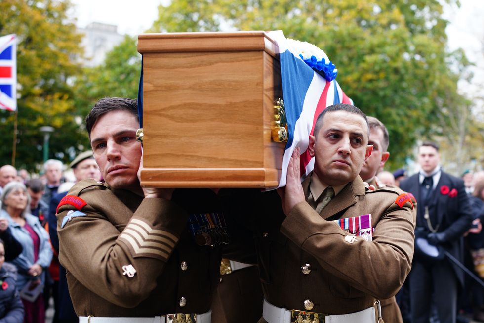 Members of the military act as the bearer party at the funeral of Dennis Hutchings, who died after contracting Covid-19 while he was in Belfast to face trial over a fatal shooting incident in Co Tyrone in 1974, at St Andrew's Church in Plymouth.