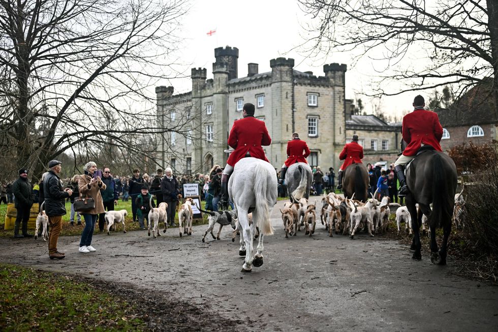 Members of the Old Surrey, Burstow and West Kent Hunt arrive to gather at Chiddingstone Castle for their annual Boxing Day hunt