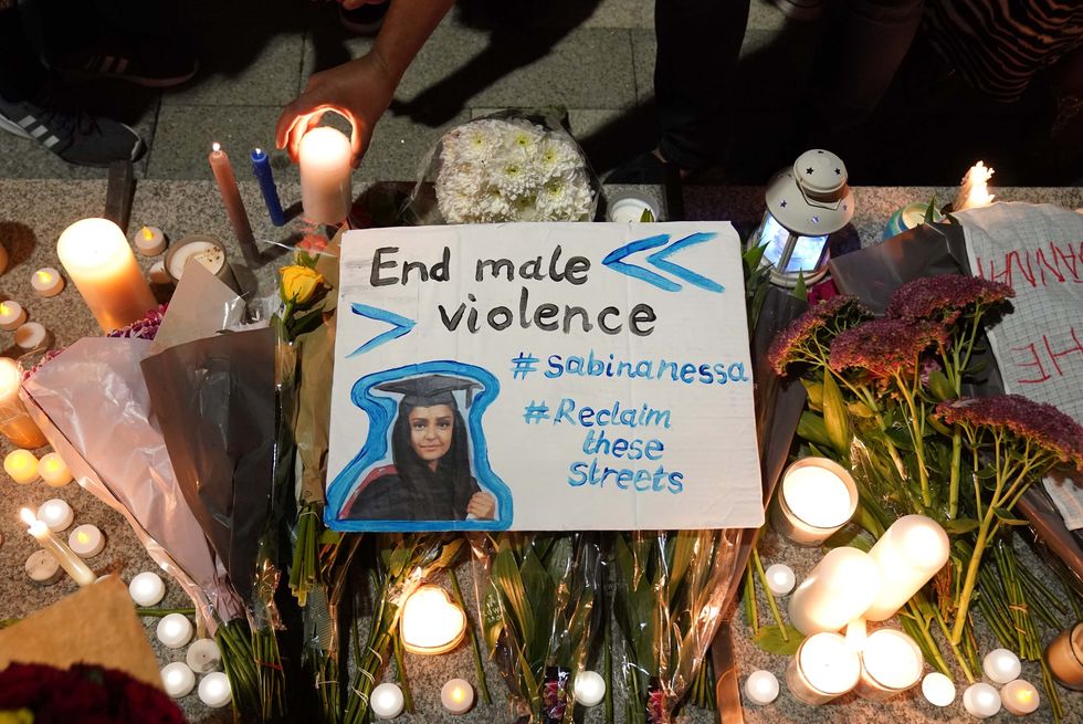Members of the public attend a vigil in memory of Sabina Nessa, and in solidarity against violence against women, at Pegler Square in Kidbrooke, south London.