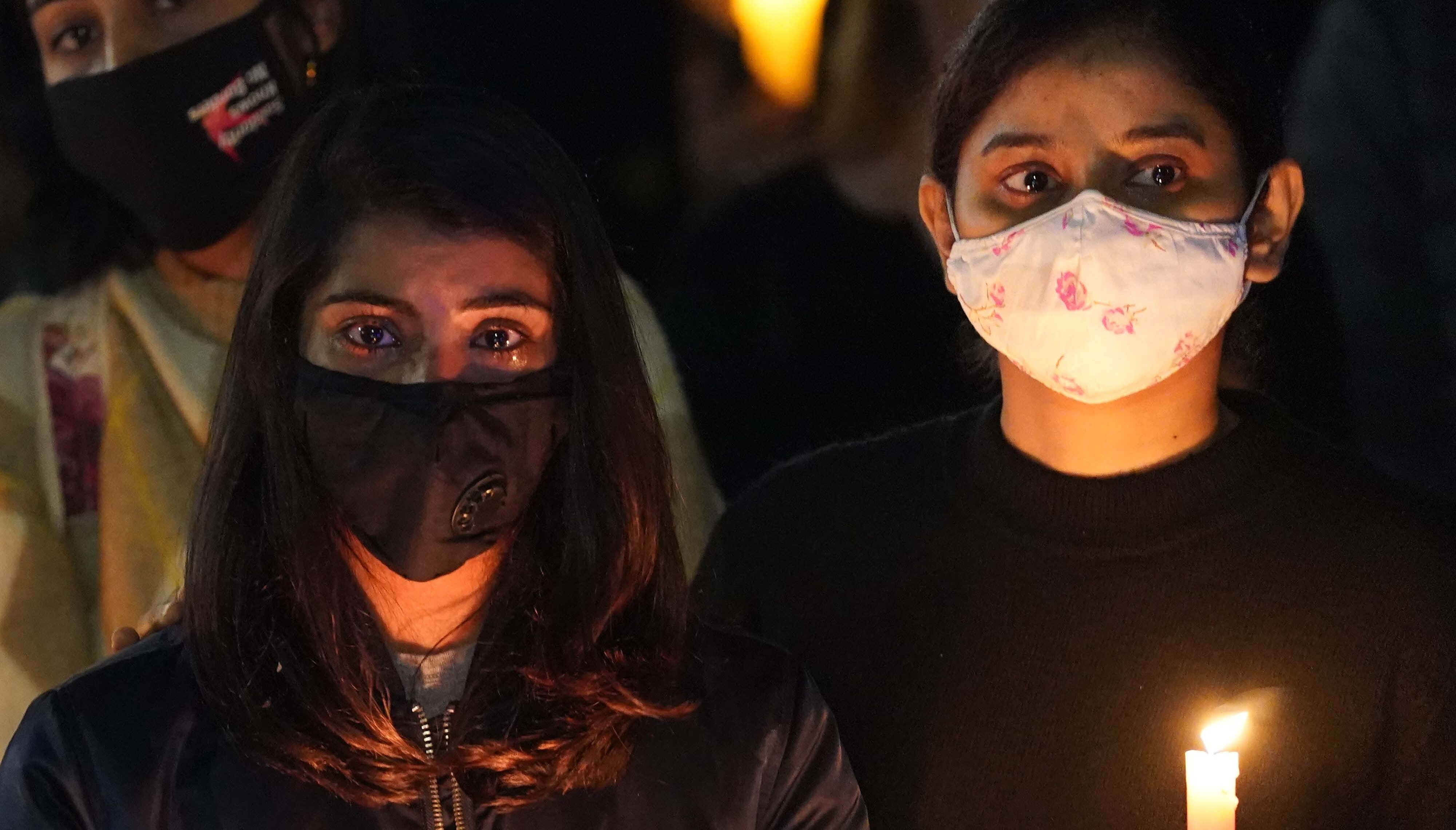 Members of the public attend a vigil in memory of Sabina Nessa, and in solidarity against violence against women, at Pegler Square in Kidbrooke, south London.