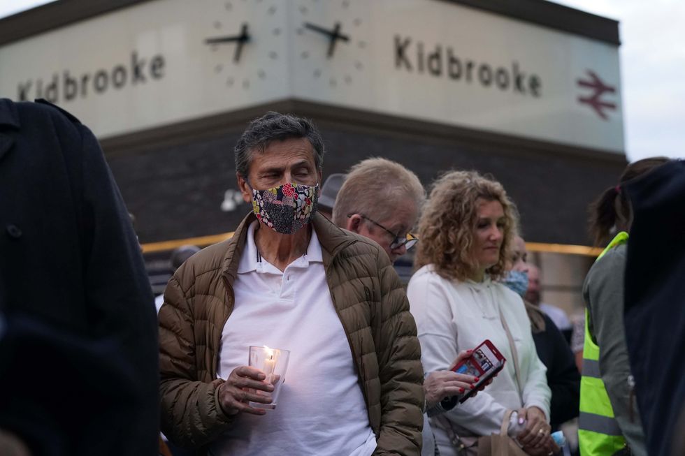 Members of the public attend a vigil in memory of Sabina Nessa, and in solidarity against violence against women, at Pegler Square in Kidbrooke, south London. The body of 28-year-old school teacher Sabina was found near the OneSpace community centre at Kidbrooke Park Road in the Royal Borough of Greenwich on Saturday. Picture date: Friday September 24, 2021.