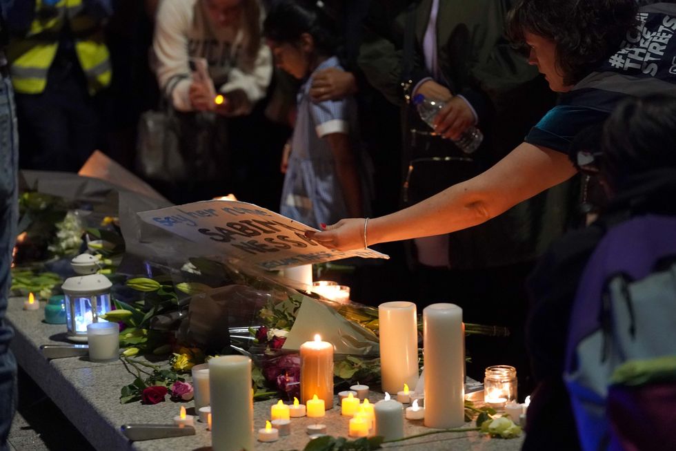 Members of the public attend a vigil in memory of Sabina Nessa, and in solidarity against violence against women, at Pegler Square in Kidbrooke, south London. The body of 28-year-old school teacher Sabina was found near the OneSpace community centre at Kidbrooke Park Road in the Royal Borough of Greenwich on Saturday. Picture date: Friday September 24, 2021.