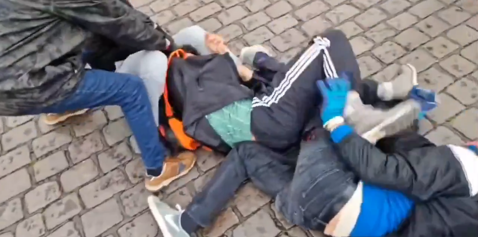Members of the public detaining the attacker