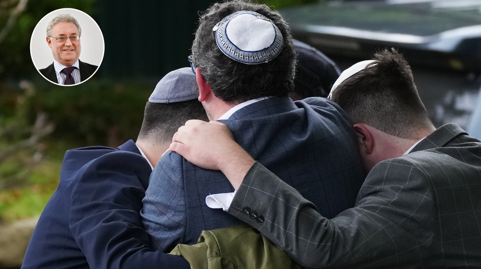 Members of the public react as they gather near the Heaton Park Hebrew Congregation Synagogue, where multiple were injured after stabbing and car attack on Yom Kippur, on October 2, 2025 in the Crumpsall suburb of Manchester, England