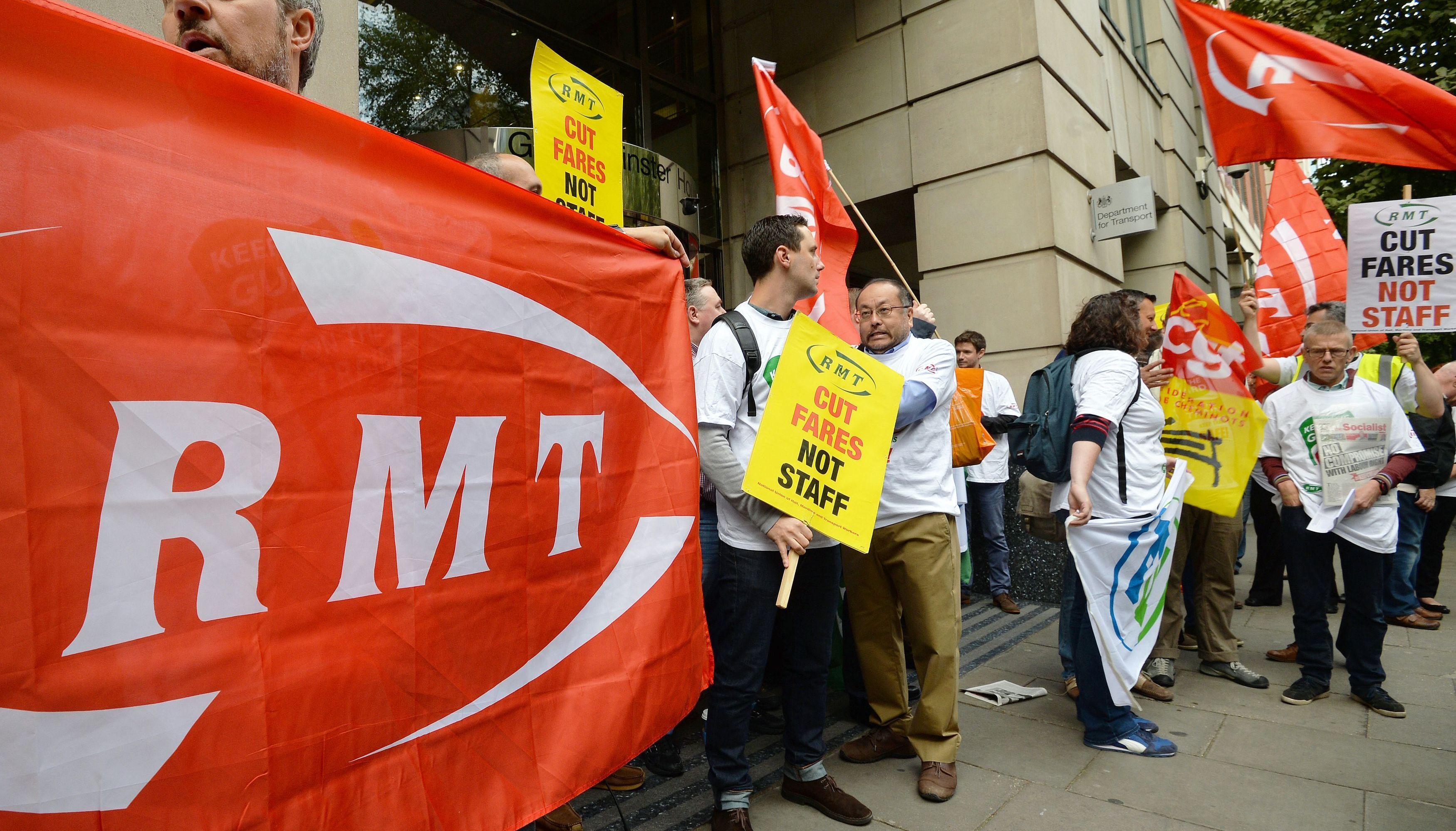 Members of the RMT union demonstrating outside the Department of Transport in Westminster, London, in 2016