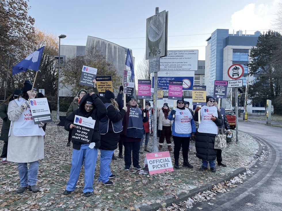 Members of the Royal College of Nursing (RCN) on the picket line outside the University Hospital Wales in Cardiff as nurses in England, Wales and Northern Ireland take industrial action over pay. Picture date: Thursday December 15, 2022.