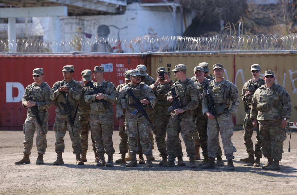 Members of the Texas National Guard are seen as Republican Governors join Texas Governor Greg Abbott for a briefing on the Operation Lone Star
