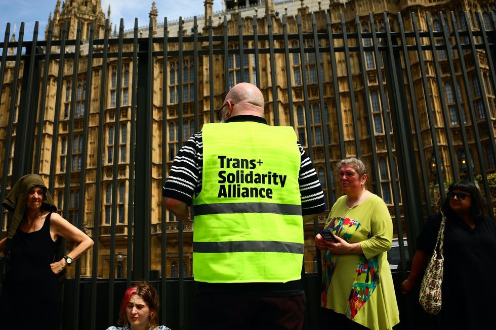 Members of the Trans+ Solidarity Alliance outside Parliament