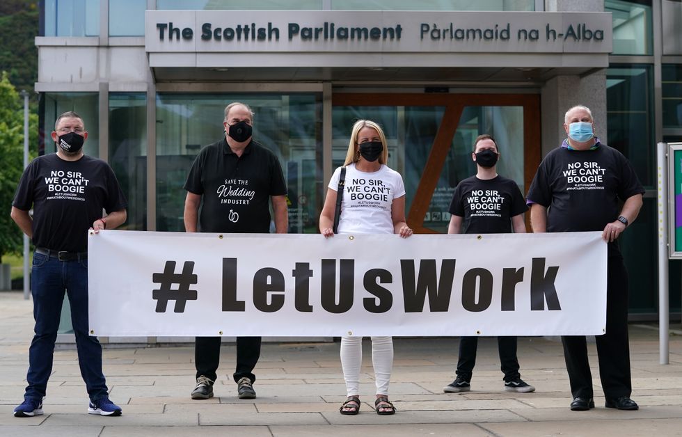 Members of the wedding industry protesting outside the Scottish Parliament in Edinburgh asking for the lifting of restrictions on Weddings.