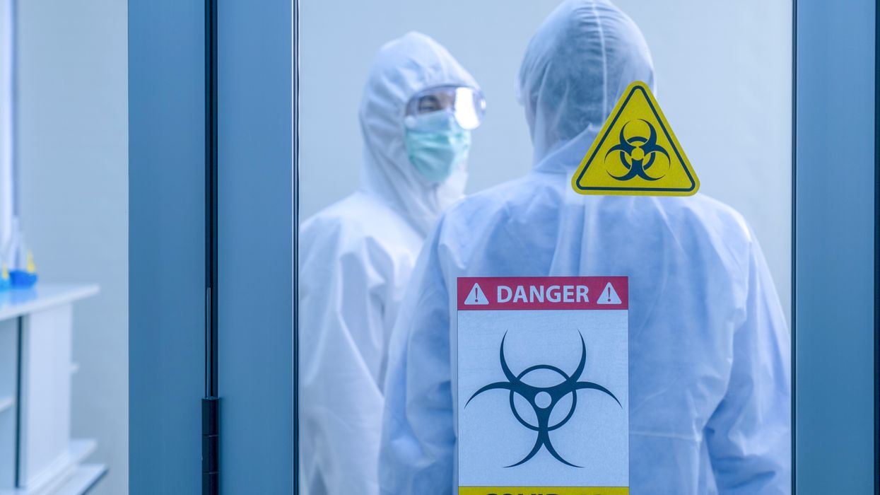 MEN IN HAZMAT SUITES