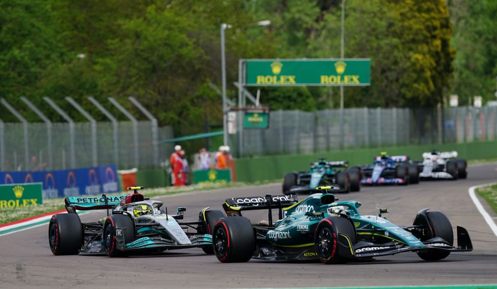 Mercedes' Lewis Hamilton struggles to get past Aston Martin's Sebastian Vettel during the sprint race of the Emilia Romagna Grand Prix at the Autodromo Internazionale Enzo e Dino Ferrari circuit in Italy, better known as Imola. Picture date: Saturday April 23, 2022.