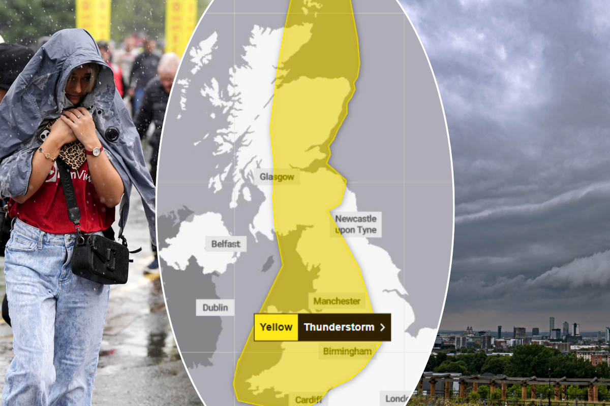 Met Office warning/person in the rain/thunder over Merseyside