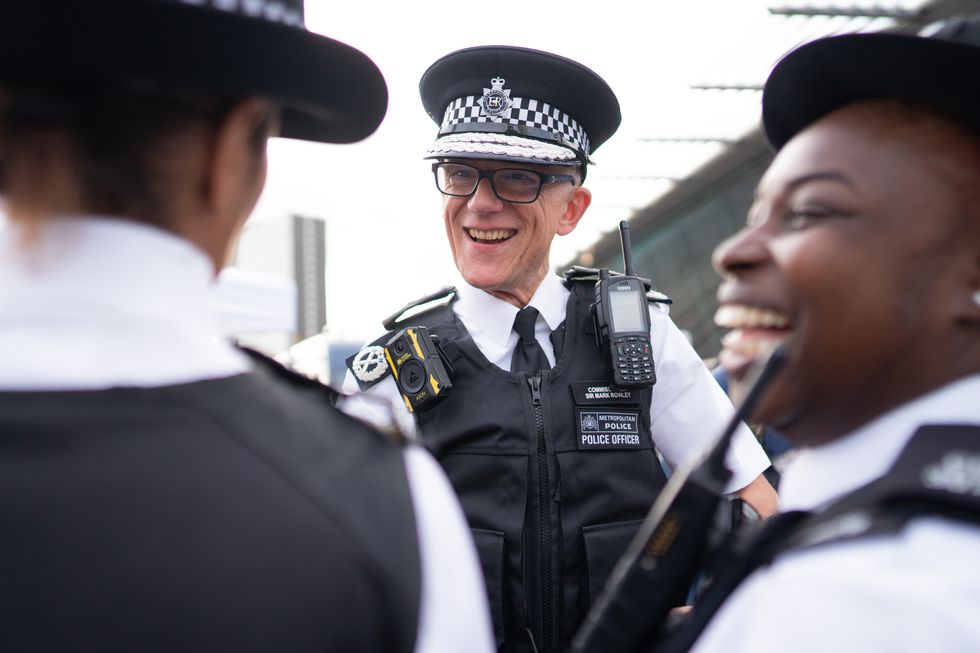 Metropolitan Police Commissioner, Mark Rowley chats to police officers, during a visit to Stratford, east London with the Community Outreach Team to engage with residents and encourage recruitment to form part of a more diverse and representative police service. Picture date: Friday October 28, 2022.