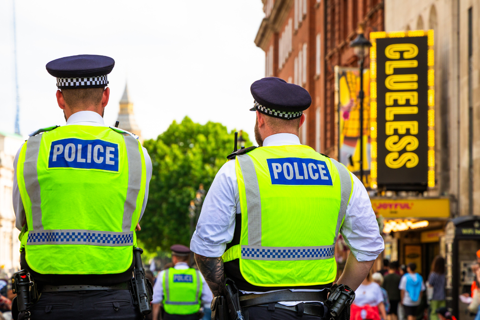 Metropolitan police officers in streets of London
