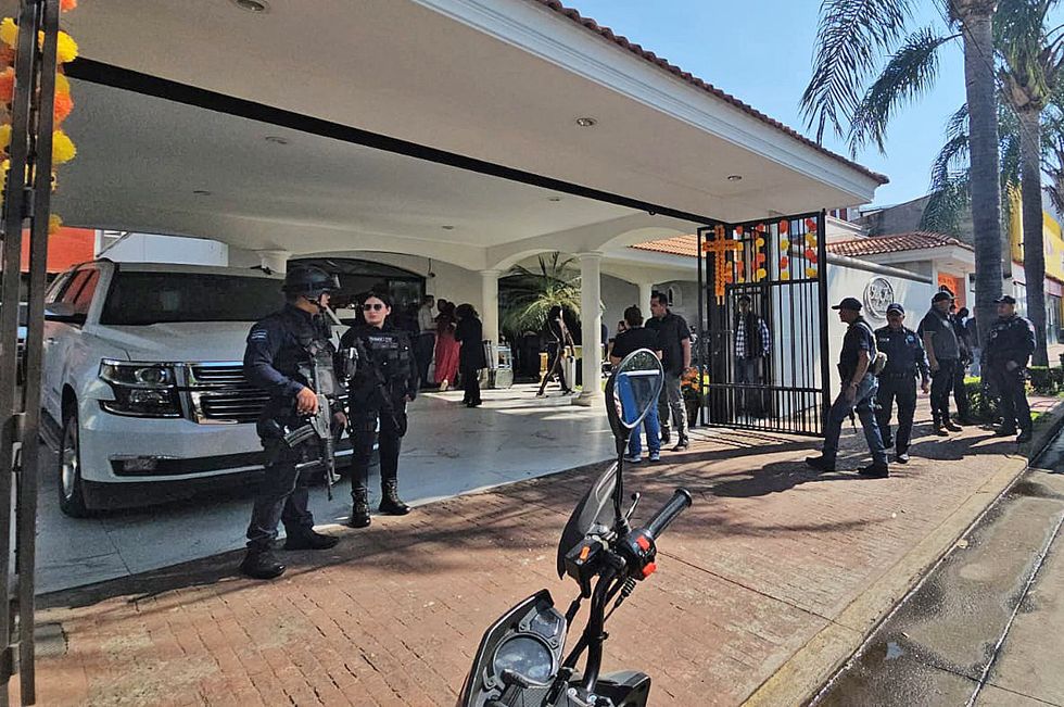 Mexican police outside a Uruapan church