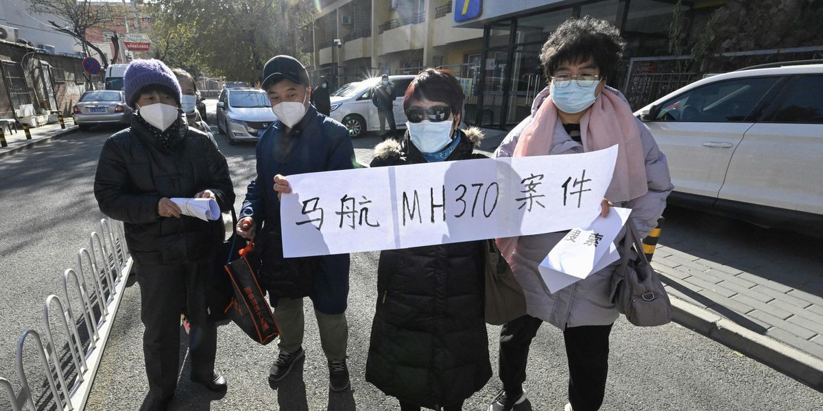 NextImg:MH370 families 'trapped in pain' as missing Malaysian Airlines search update sparks anger