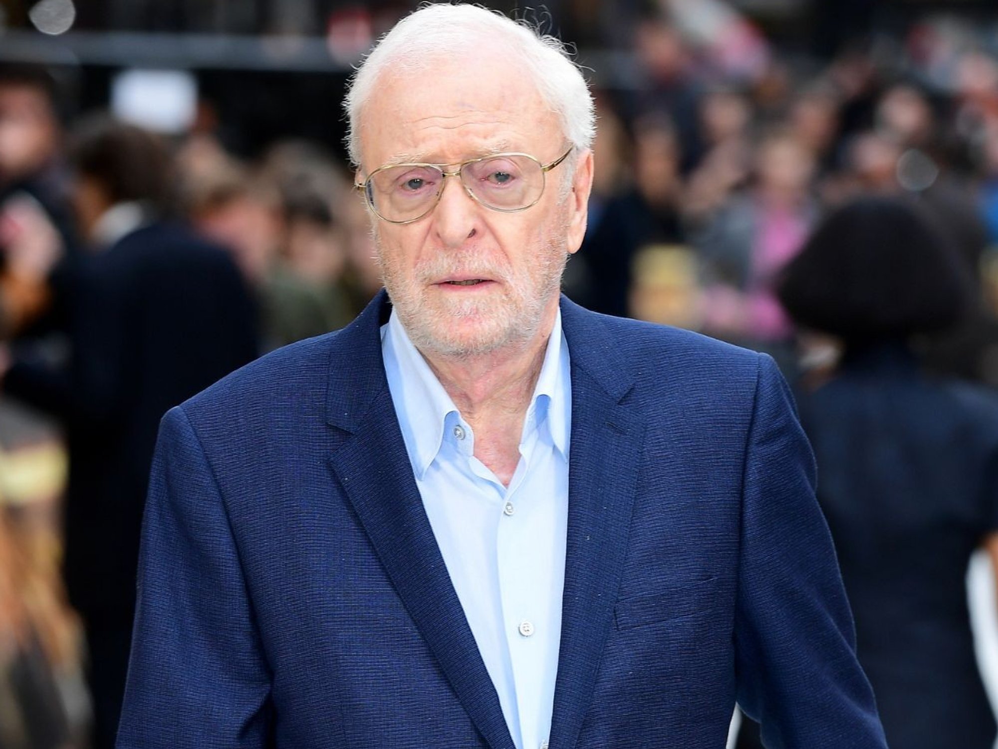 Michael Caine with a walking stick