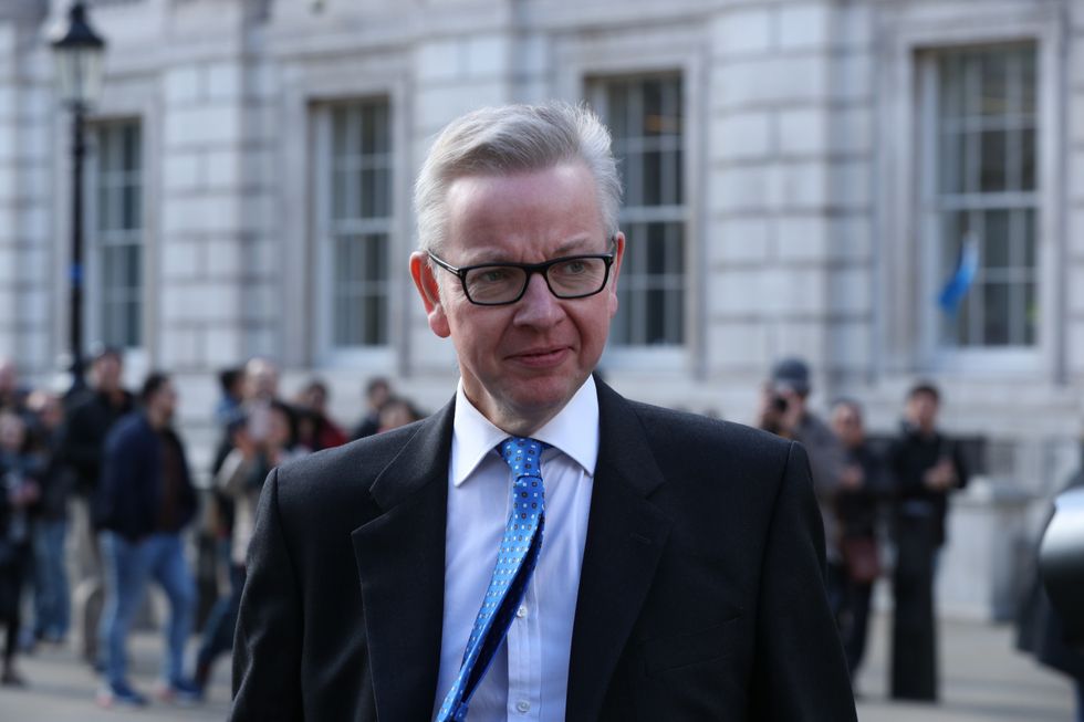 Michael Gove leaves the Cabinet Office in Westminster, London.