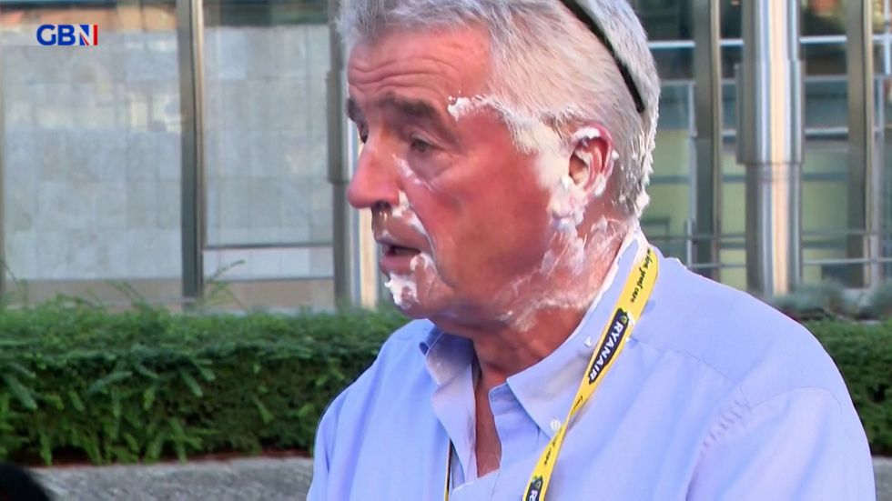 Michael O'Leary covered in pie cream